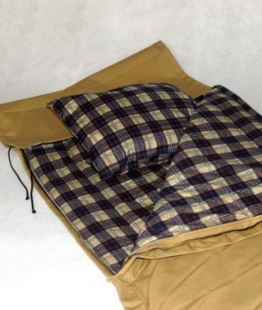 Unrolled Horseback Bedroll with black fleece interior and tan canvas exterior